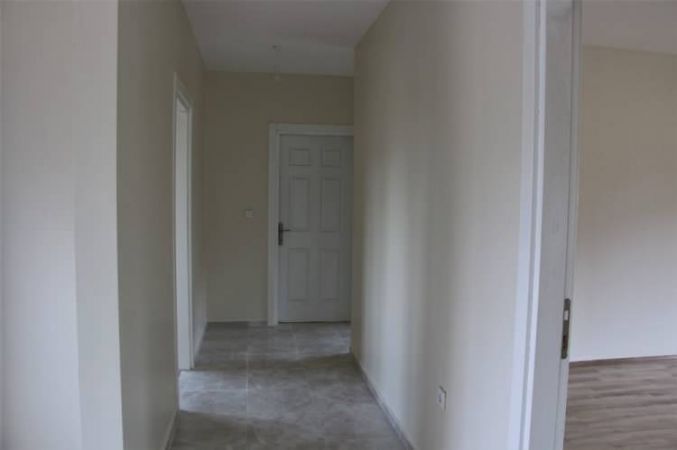 ÇEVRİMTAŞ KÖYÜNDE YAPILAN EVLERDEN İLKİ SAHİBİNE TESLİM EDİLDİ