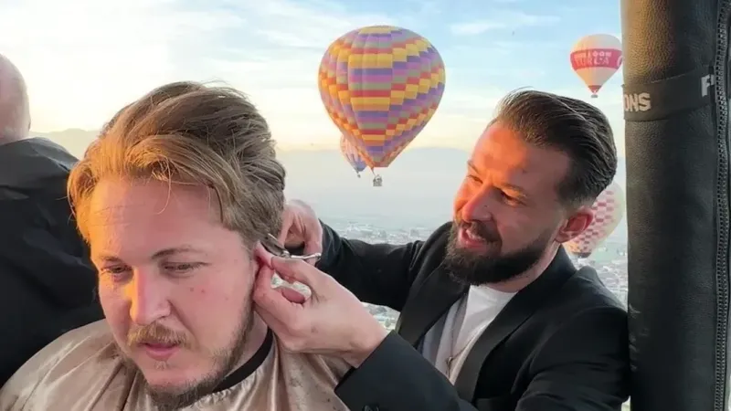 Müşterisini yerden 300 metre yükseklikte tıraş etti