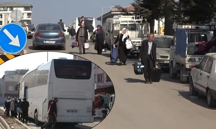 Hataylılar yerle bir olan şehirden otobüslerle terk ediyor